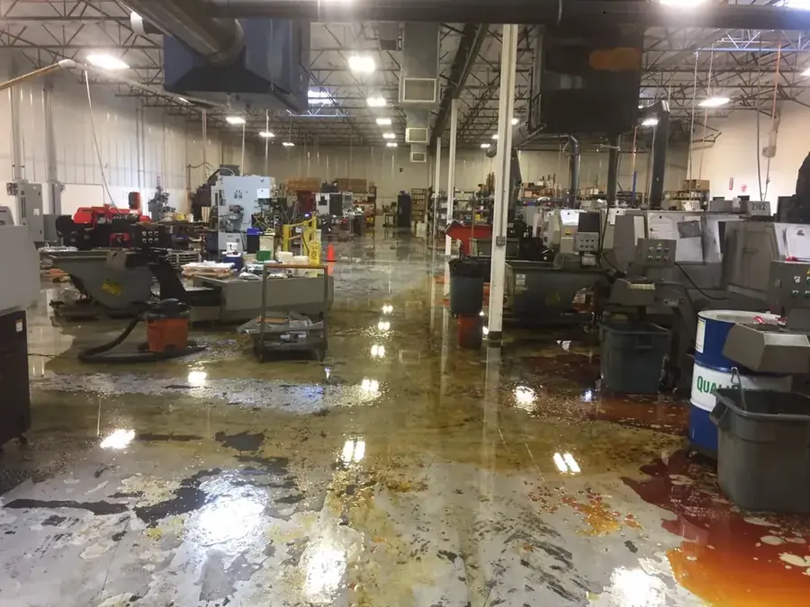 Restoration technician drying a flooded Murrieta, CA home with air movers