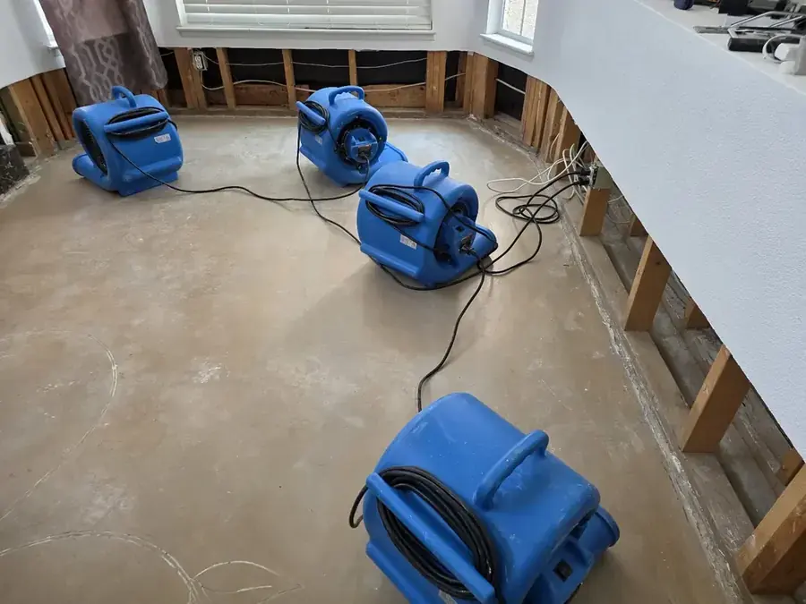 Air movers and dehumidifiers drying a Murrieta, CA room