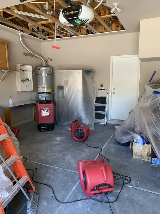 Water heater flood in a Murrieta, CA garage